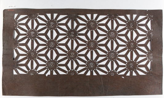 Japanese katagami paper stencil cut with a repeating asanoha hemp-leaf pattern of linked six-pointed stars, early 19th century