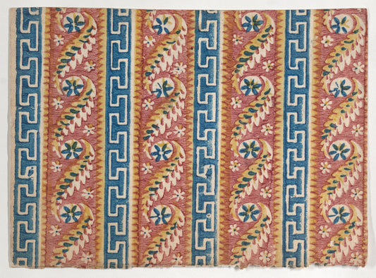 Eighteenth-century relief-printed decorative paper with vertical blue Greek key stripes alternating with paisley and flower stripes on a pink ground