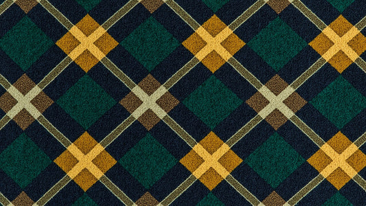 Argyle sweater pattern showing overlapping diamonds in red, navy, and gold with diagonal cross-hatch overlay