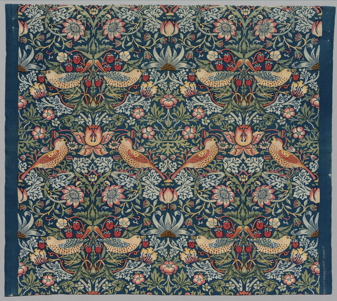 Strawberry Thief printed cotton designed by William Morris, paired thrushes among strawberries and flowers on a dark indigo ground, this length printed at Merton Abbey about 1936