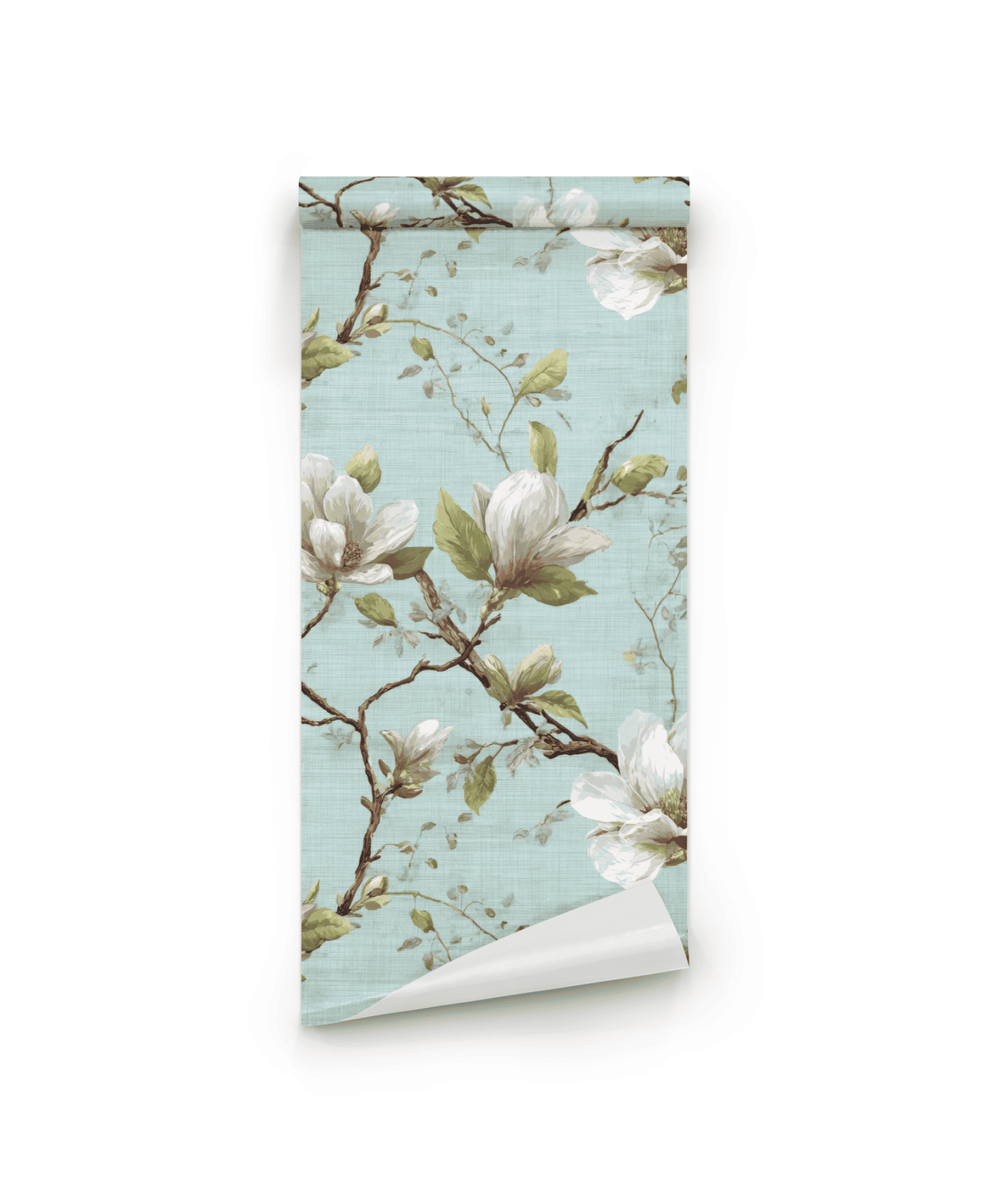Magnolia Dream Wallpaper features a light blue background with tranquil magnolia blossoms and green leaves on brown branches, bringing a natural vibe to any space.