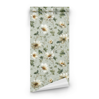 Green Floral Wallpaper roll close-up showing the verdure botanical drawing in soft green-and-cream tones