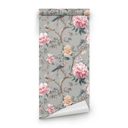 Grey Floral Wallpaper roll close-up showing the songbird and flowering branch detail on the grey ground in fine line work