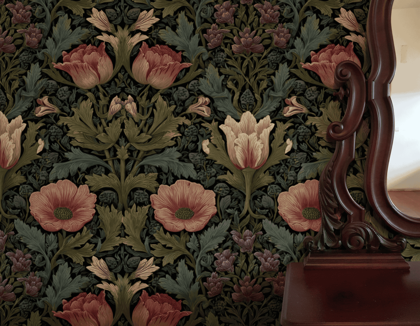 The Eternal Blossom Wallpaper features dark florals with red and cream poppies and leafy patterns, bringing vintage charm that's partially reflected in a wooden framed mirror on the right.