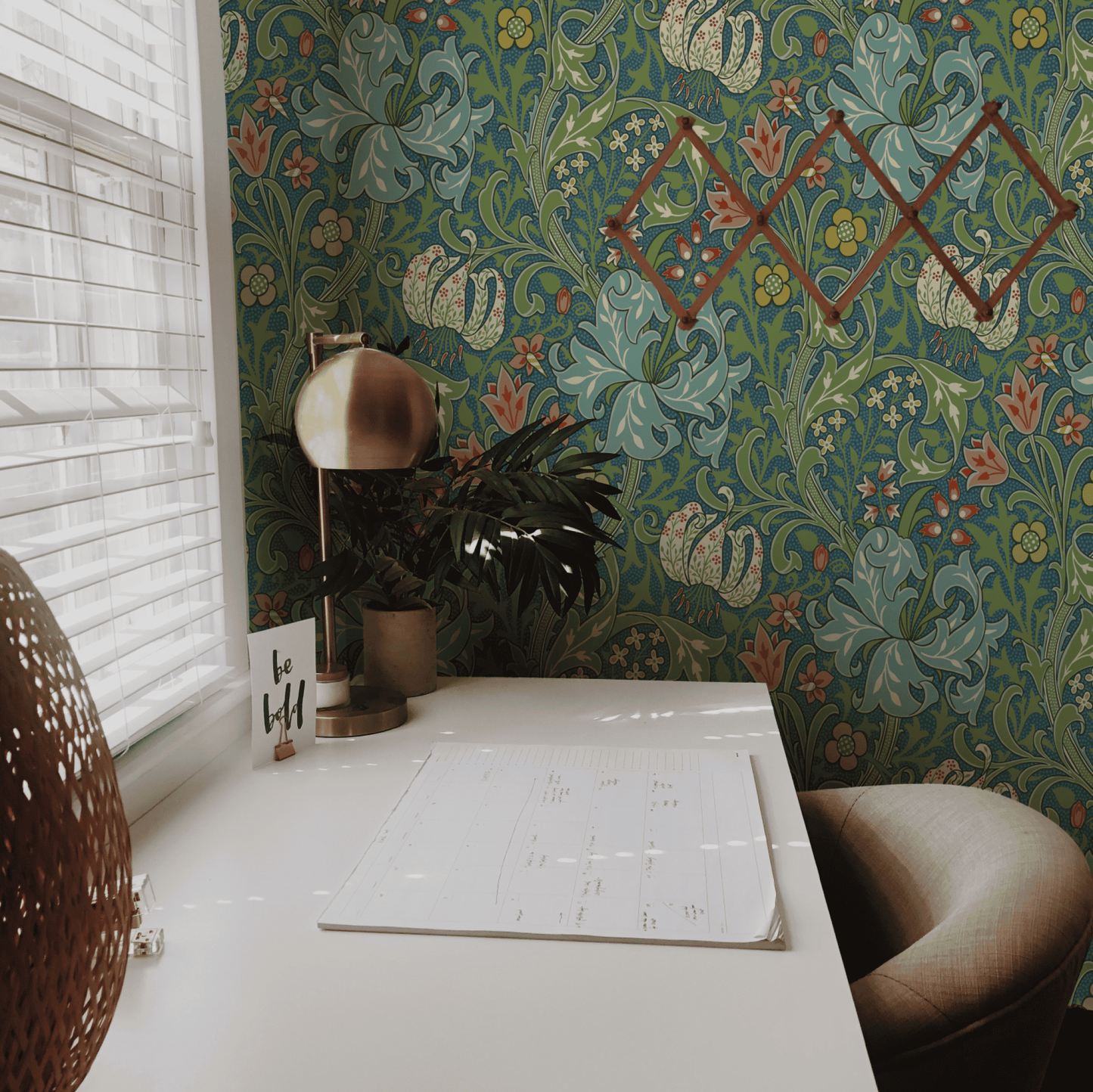 Green Floral Wallpaper installed on a room wall with the John Henry Dearle lily design for Morris and Co in teal Victorian palette