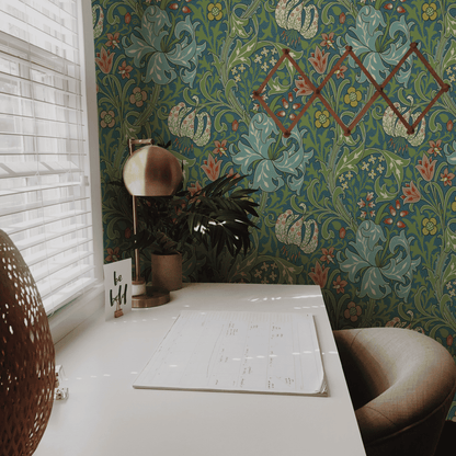 Green Floral Wallpaper installed on a room wall with the John Henry Dearle lily design for Morris and Co in teal Victorian palette