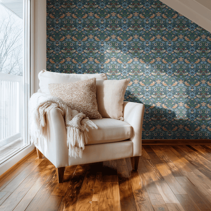 Blue Bird Pattern Wallpaper shown in a second room with the indigo Strawberry Thief reading as iconic Morris decoration in a calmer palette
