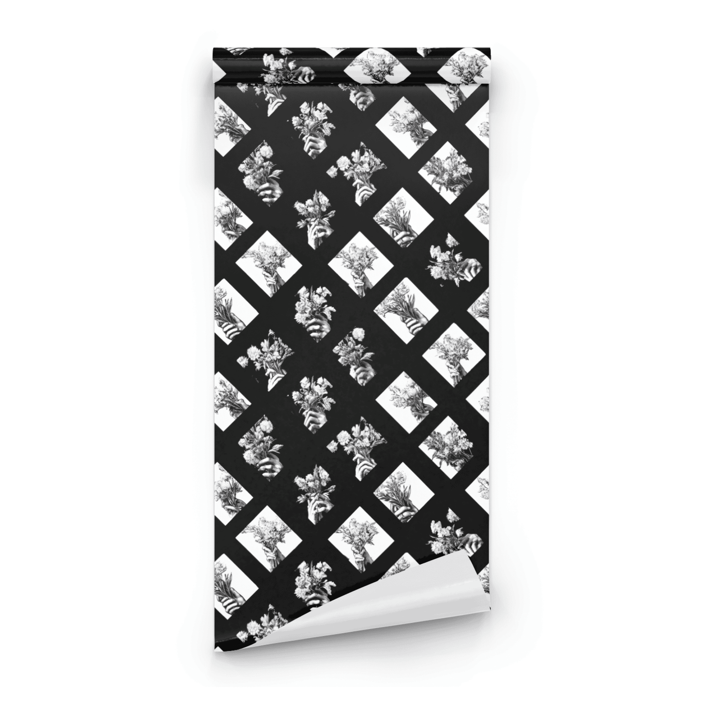 Gothic Bouquet wallpaper with bold black-and-white moody floral and geometric bouquet pattern, shown as a wallpaper roll close-up revealing the printed detail