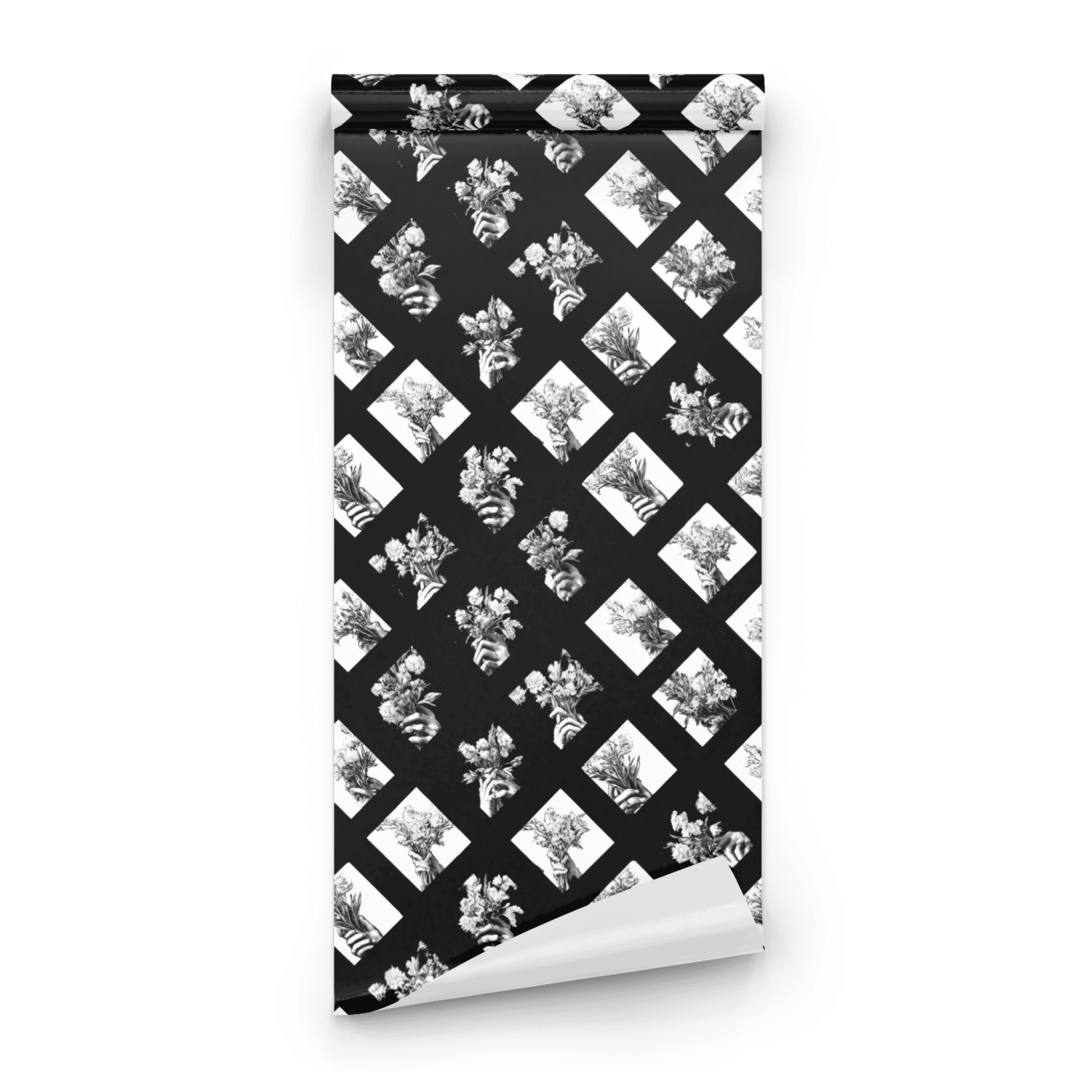 Gothic Bouquet wallpaper with bold black-and-white moody floral and geometric bouquet pattern, shown as a wallpaper roll close-up revealing the printed detail