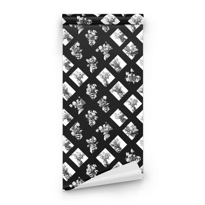 Gothic Bouquet wallpaper with bold black-and-white moody floral and geometric bouquet pattern, shown as a wallpaper roll close-up revealing the printed detail
