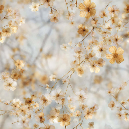 Wallpaper with delicate floral pattern in soft beige and white tones.