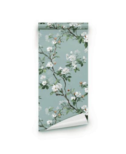 Blossom Serenity Wallpaper features a soft teal background with white blossoms and green branches—perfect for creating a tranquil ambiance.