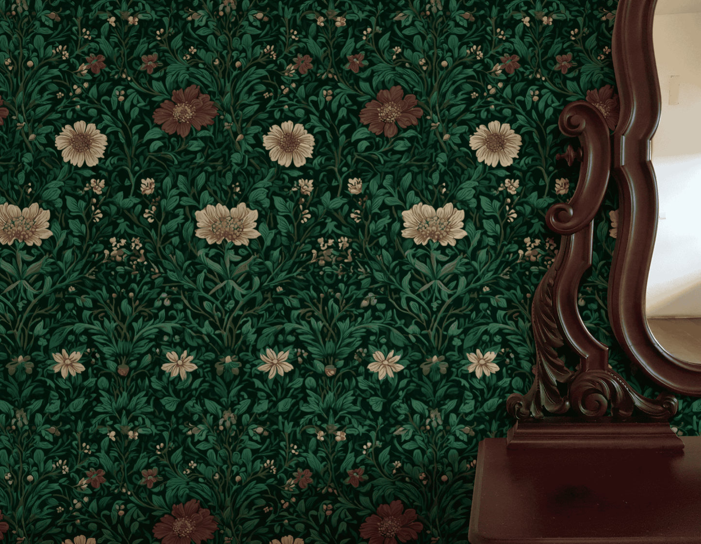 The Eden Flora Wallpaper adds timeless elegance in a green floral design, beautifully complementing a dark wooden framed mirror that reflects part of a beige wall.