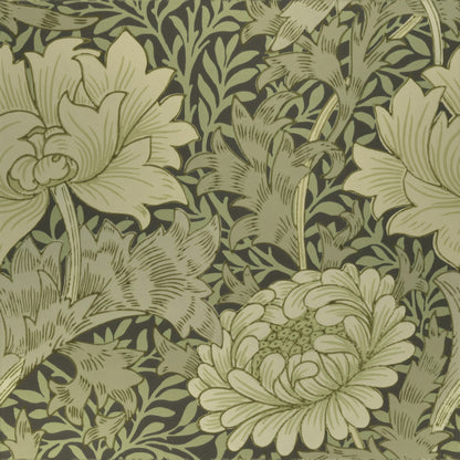 Large pale-olive chrysanthemum blooms and leaves over a dark sage foliage ground, a William Morris design.