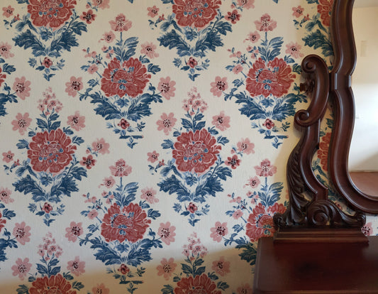 Claret Damask large scale wallpaper in a styled room