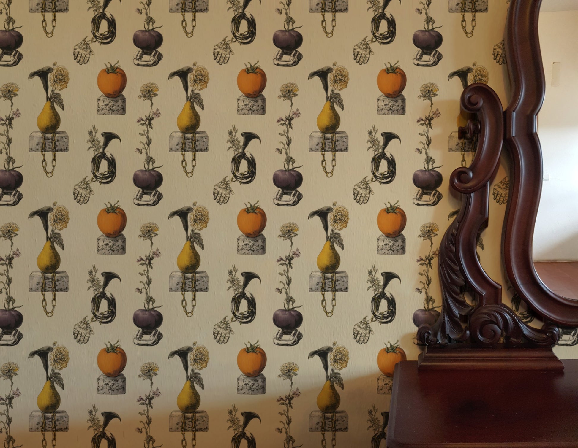 Surreal still-life wallpaper of pears and tomatoes on cinderblocks with chains, a hand and calla lilies on cream.