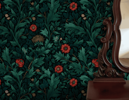 An ornate dark wood mirror stands beside a wall covered in Emerald Flora Wallpaper, which features dense green foliage and elegant nature designs with subtle red blooms.