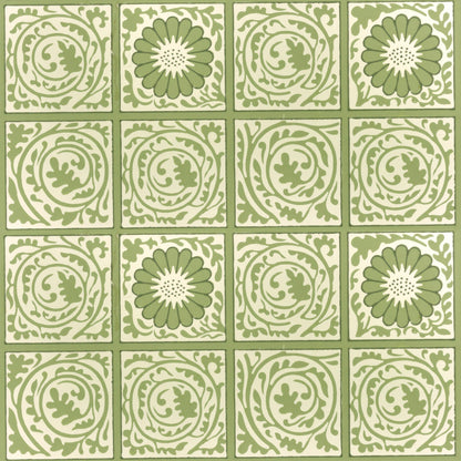 Grid of green-and-cream tiles alternating leaf medallions and daisy rosettes, a William Morris design.