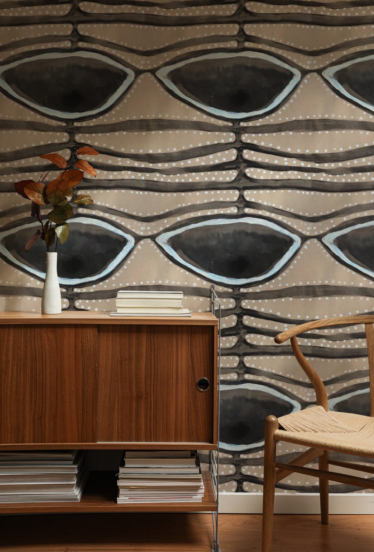 Earthen Current wallpaper on a wall in a styled room