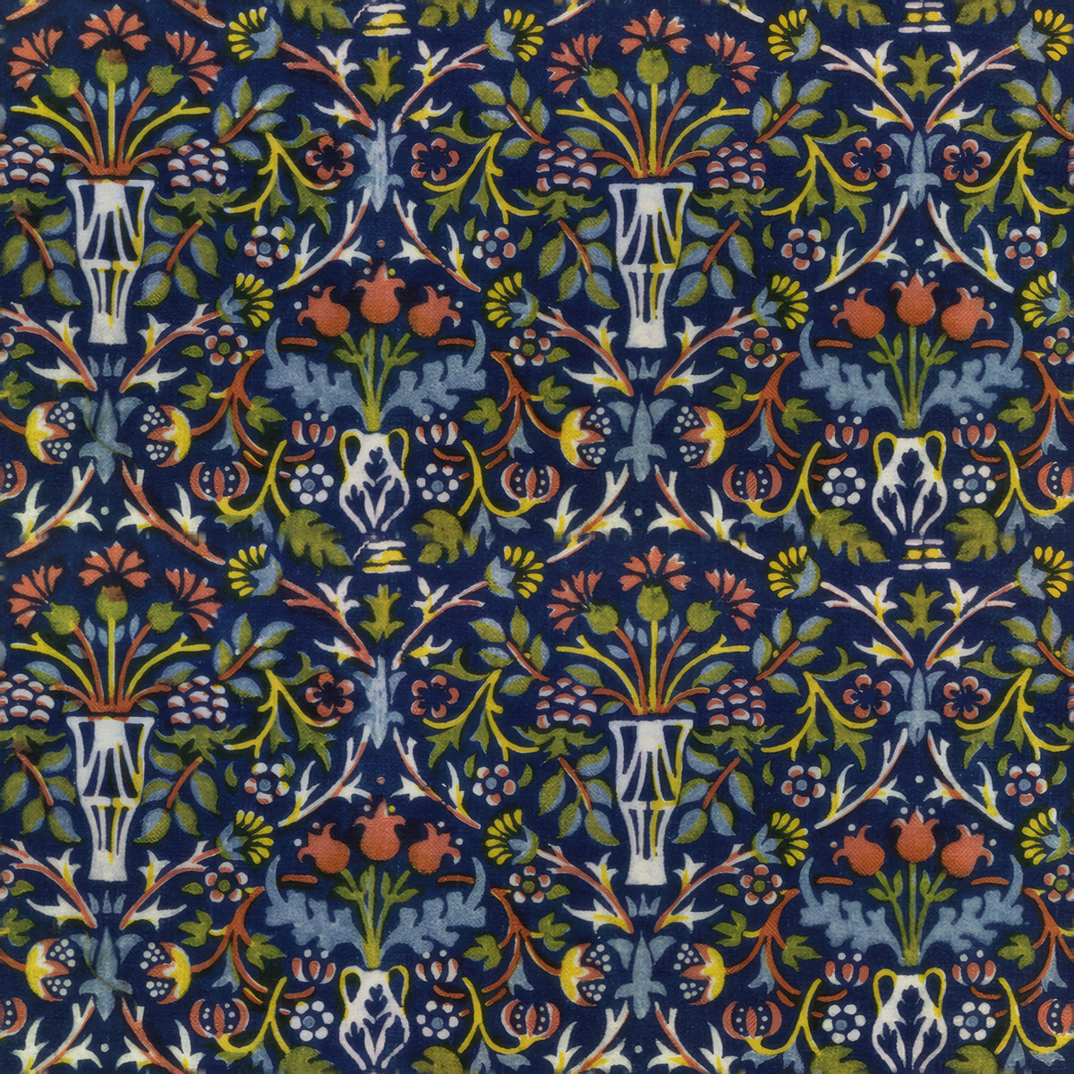 Pale vases of red, gold and blue flowers among leafy scrolls on deep navy, a William Morris design.
