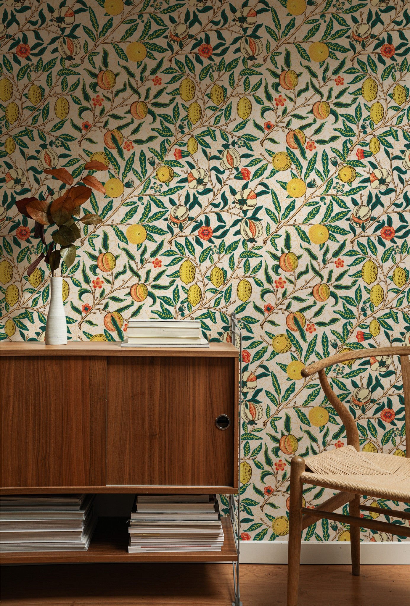 Cream Botanical Wallpaper installed on a room wall with the Morris fruit and pomegranate design in cream Victorian palette