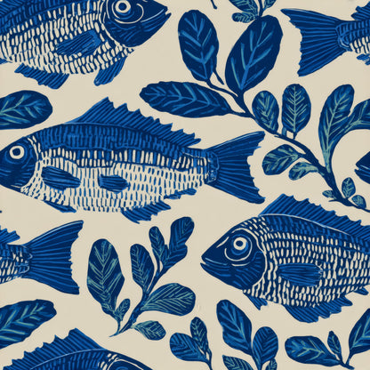 Block printed indigo fish and leaf sprigs on a cream ground.