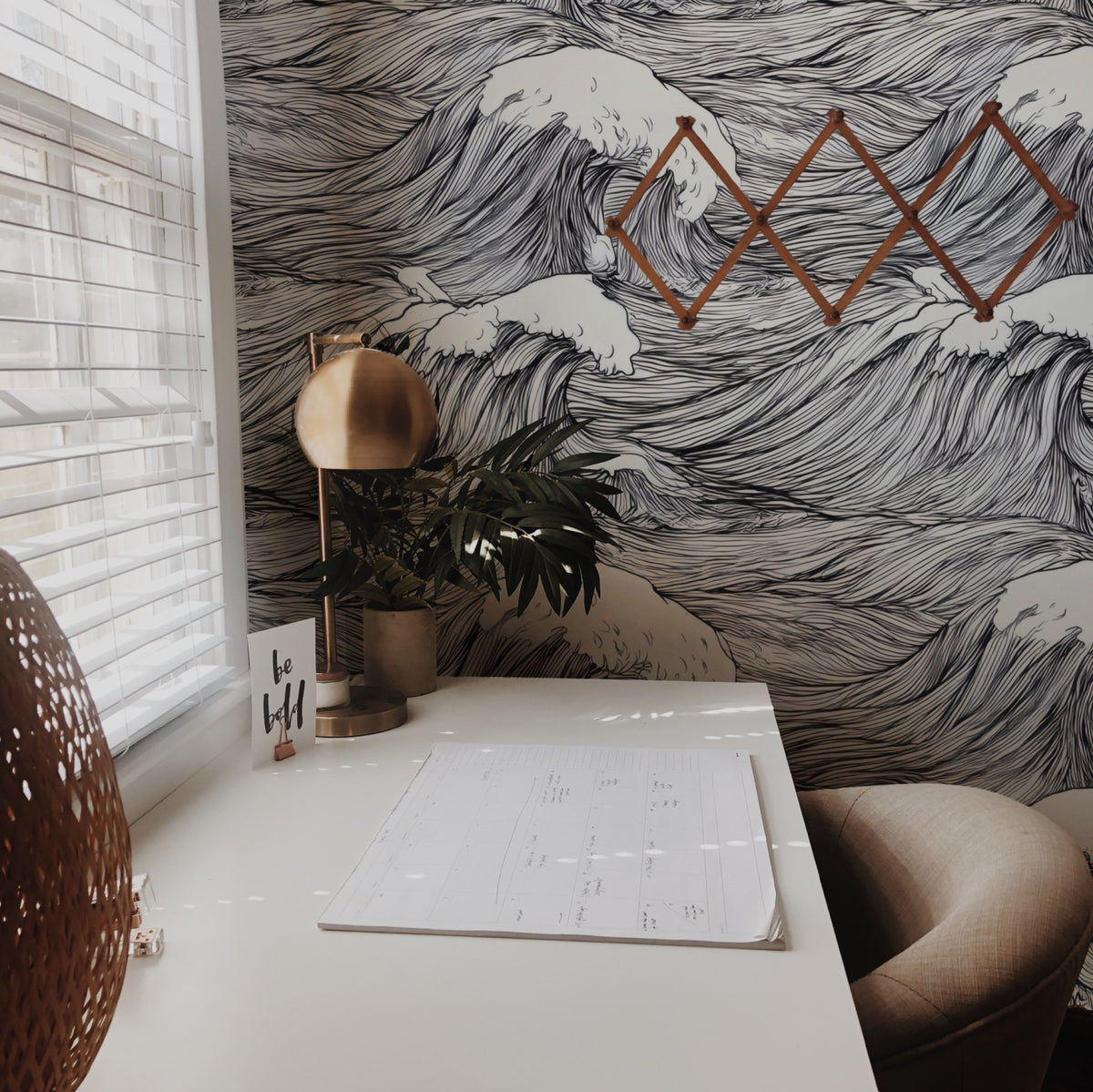 Ink Surf large scale wallpaper in a styled room