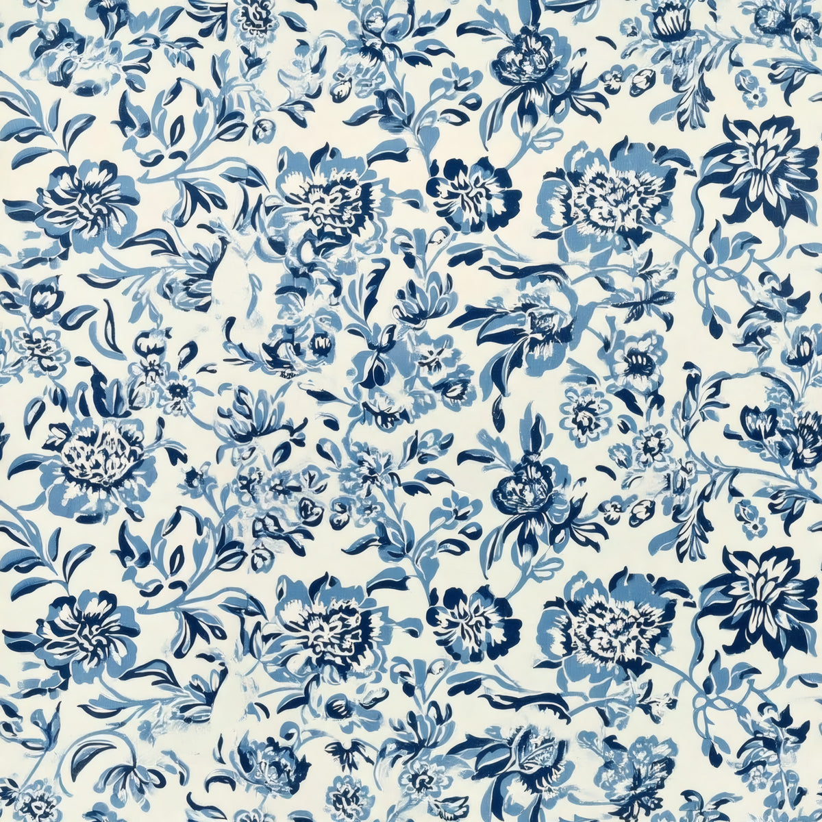A dense trail of blue flowers and leaves in Delft blues on a white ground, a William Morris design.