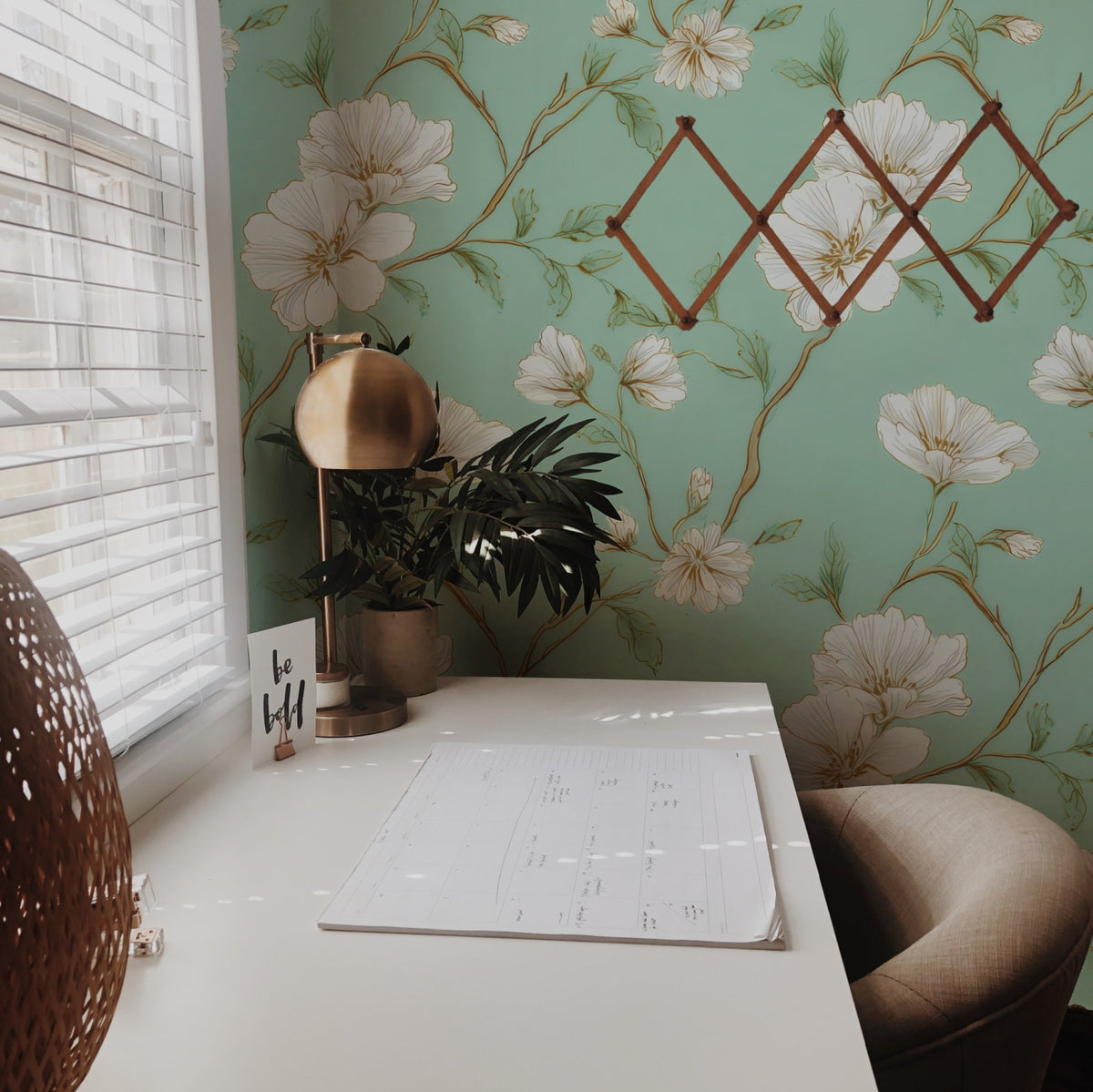 Mint Blossom large scale wallpaper in a styled room