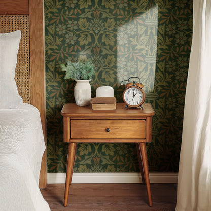 William Morris Flower Garden Green wallpaper on a wall — Bedside table with clock scene