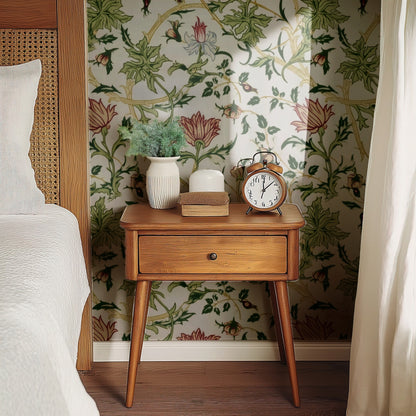 William Morris Briar Dove wallpaper on a wall — Bedside table with clock scene