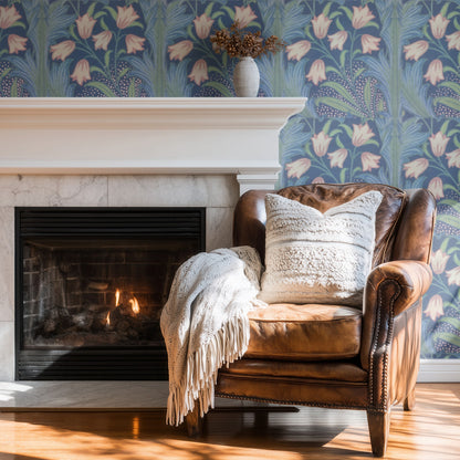 William Morris Harebell Blue wallpaper on a wall — Wingback chair by fire scene