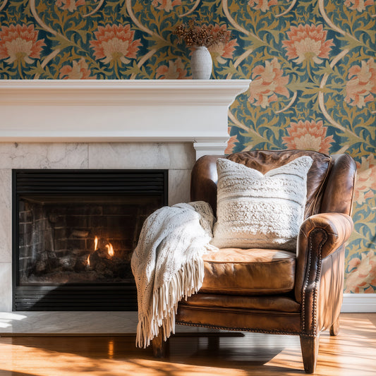 William Morris Five Flowers Teal wallpaper on a wall — Wingback chair by fire scene