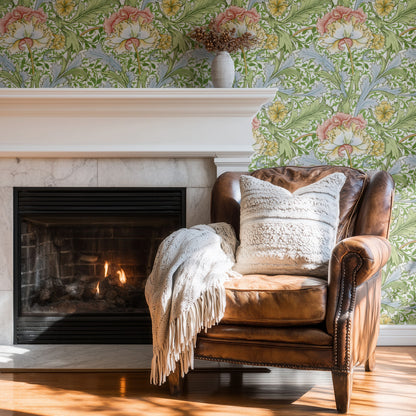 William Morris Myrtle Green wallpaper on a wall — Wingback chair by fire scene