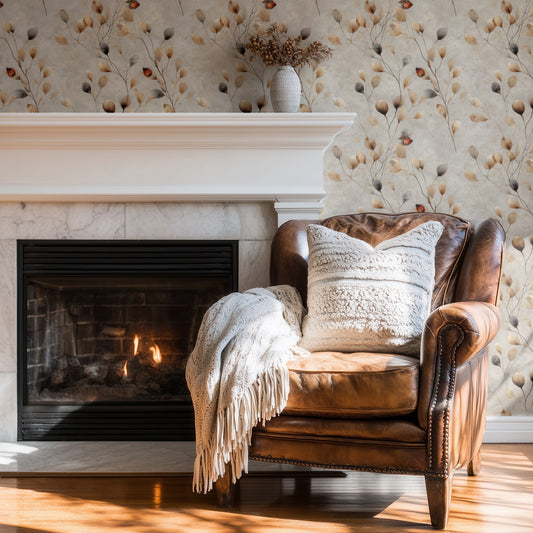 Ladybird Sprigs wallpaper on a wall — Wingback chair by fire scene