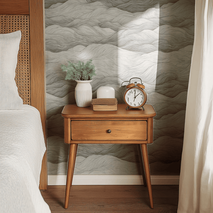 Grey Abstract Wallpaper shown in a second interior with the silken swirls reading as softly atmospheric contemporary decoration