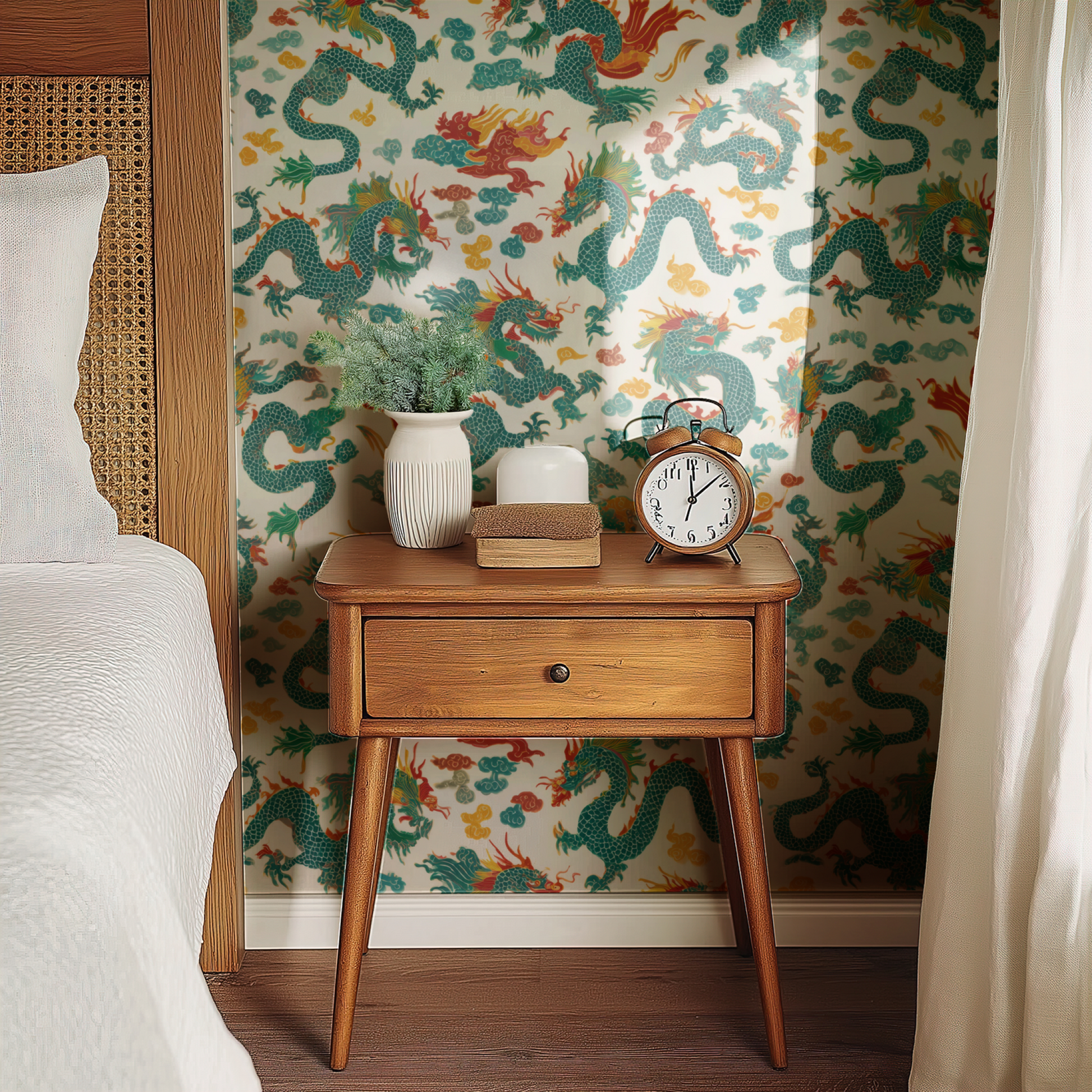Jade Dynasty wallpaper with chinoiserie florals in cream and jade green, shown installed on a living-room wall at room scale