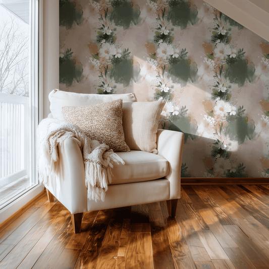 Painted Flora wallpaper with watercolor painted florals in soft pink, shown installed on a living-room wall at room scale