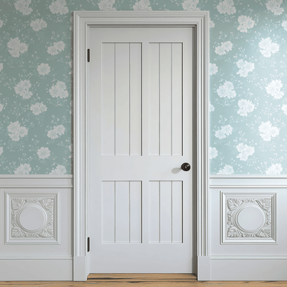 Green Floral Wallpaper shown in a second room with the chalky green wildflowers giving the wall an aged country-cottage atmosphere
