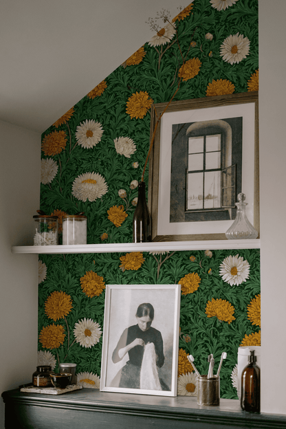 Green Floral Wallpaper installed in a room interior with Arts and Crafts marigold florals in deep emerald green Victorian palette