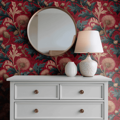 Red Botanical Wallpaper shown in a second room with the dark red acanthus reading as theatrical evening dining-room decoration