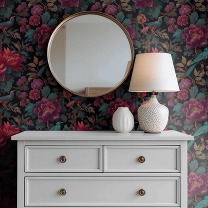 Black Floral Wallpaper shown in a second interior with the dark paradise birds and florals reading as theatrical evening decoration