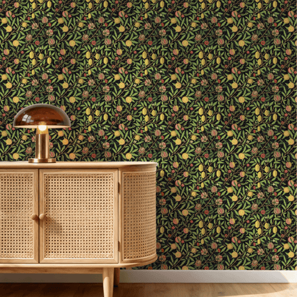 Black Botanical Wallpaper installed in a room interior with the Morris dark fruit and pomegranate design in dark botanical Victorian palette