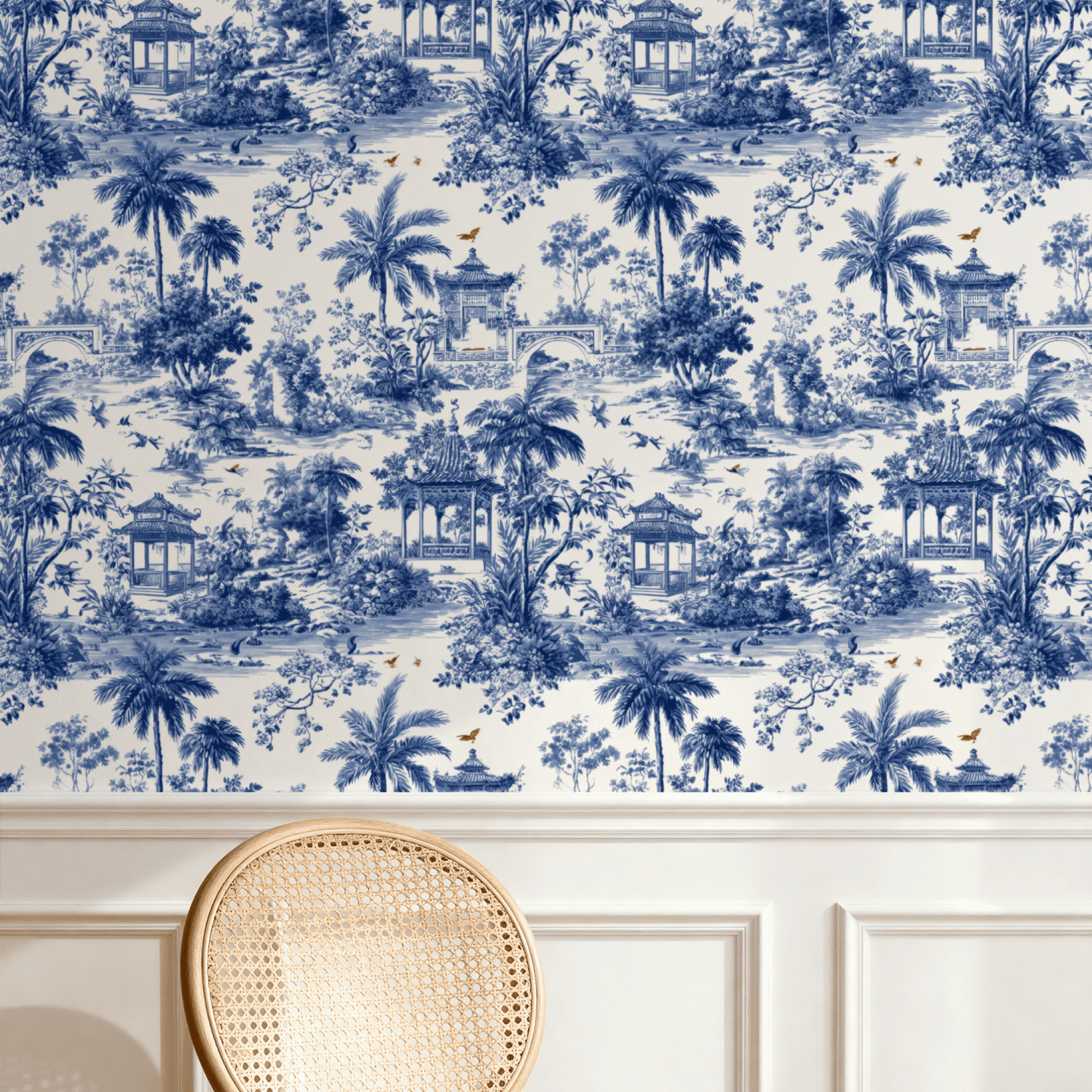 Blue Toile Wallpaper installed on a room wall with blue-and-white scenic toile pattern in monochrome ink