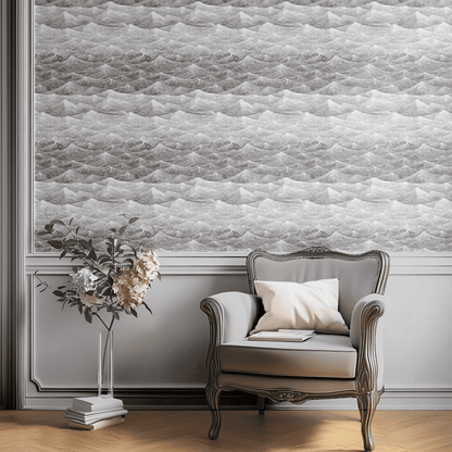 Grey Abstract Wallpaper installed in a room interior with Mid-Century Modern monochrome sketched ocean wave pattern in grey