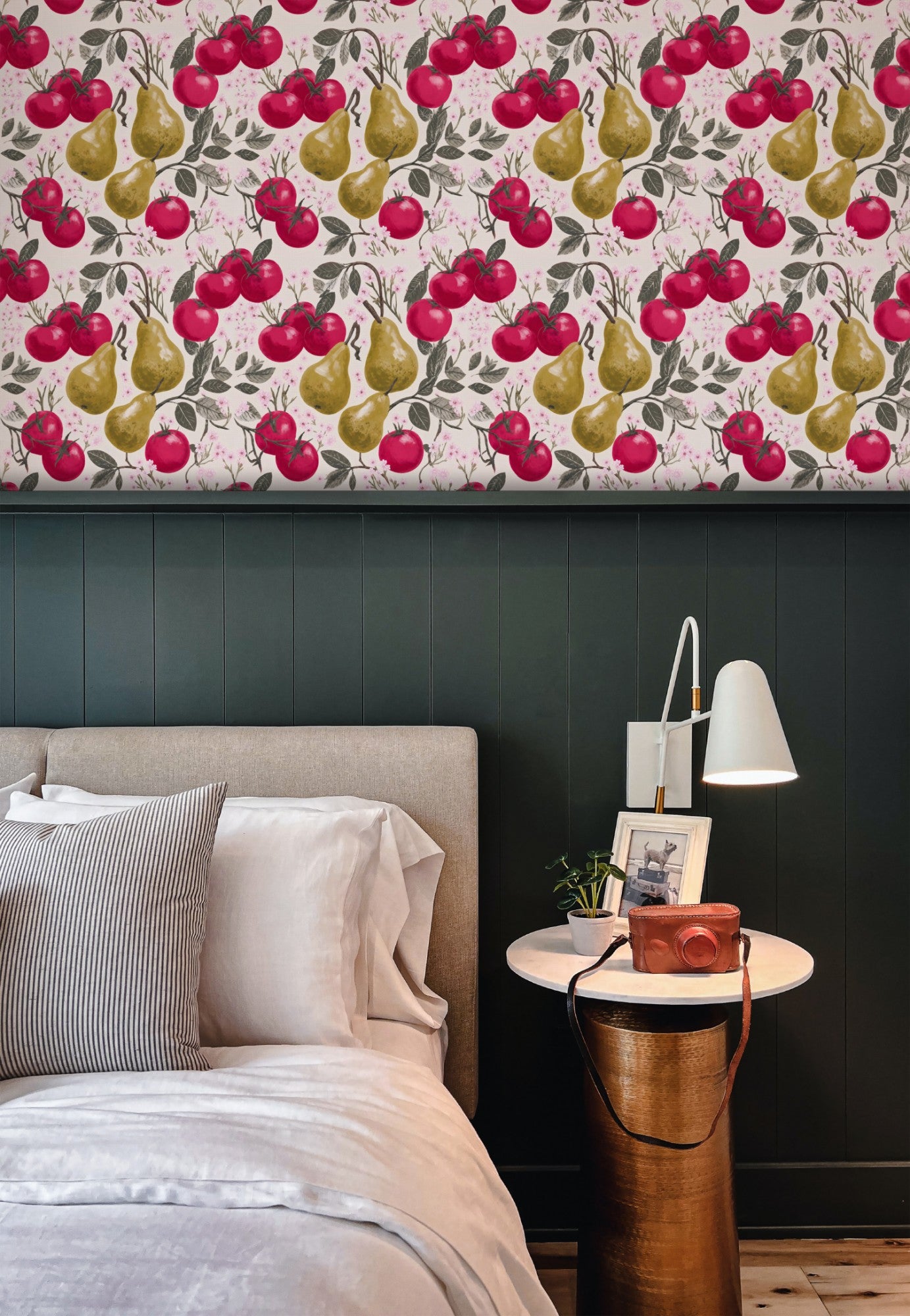 Crimson tomatoes and golden pears with pink cherry blossom on a warm cream ground in a lush fruit wallpaper. - room view