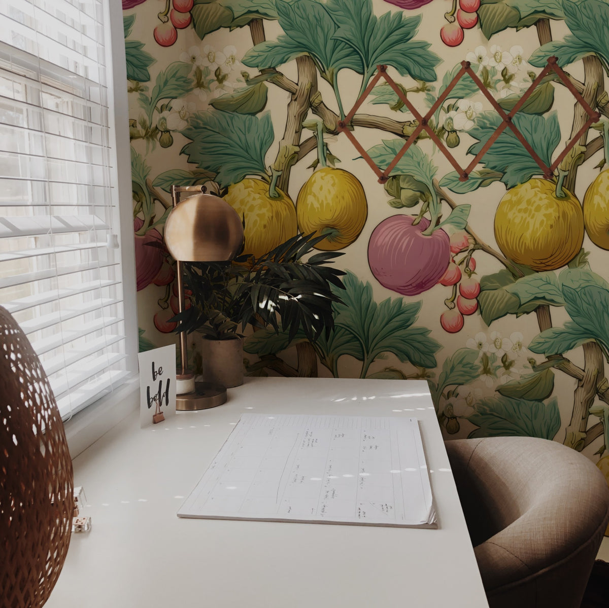 Rosy Orchard large scale wallpaper in a styled room