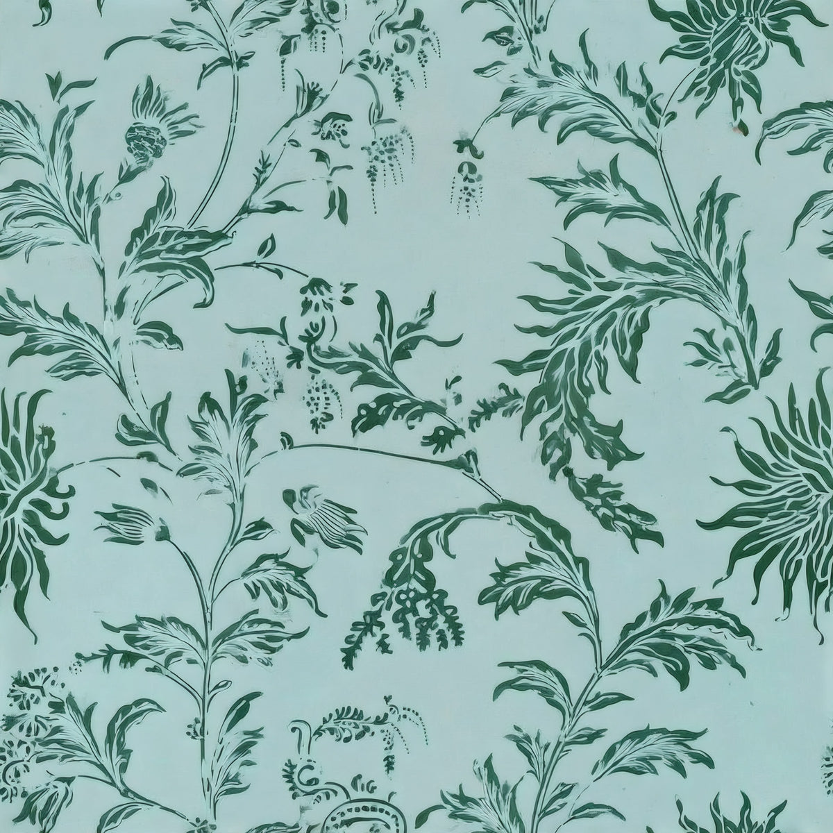 Deep green leafy sprays scatter across a soft duck-egg blue ground, a William Morris design.