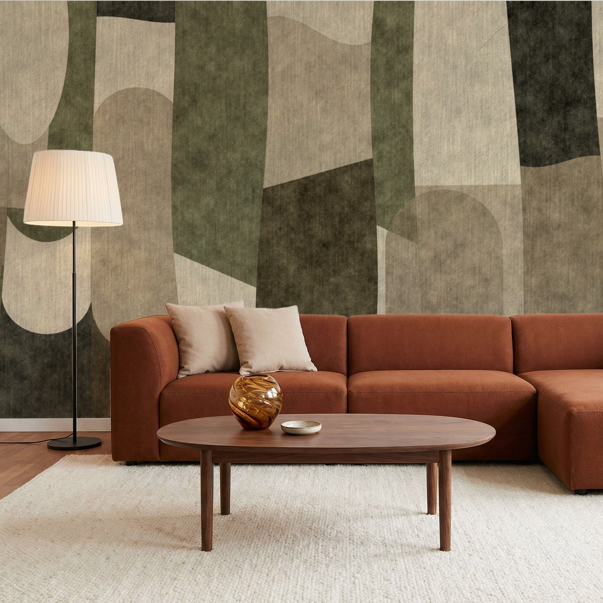 Stone Collage mural behind a rust sofa and floor lamp