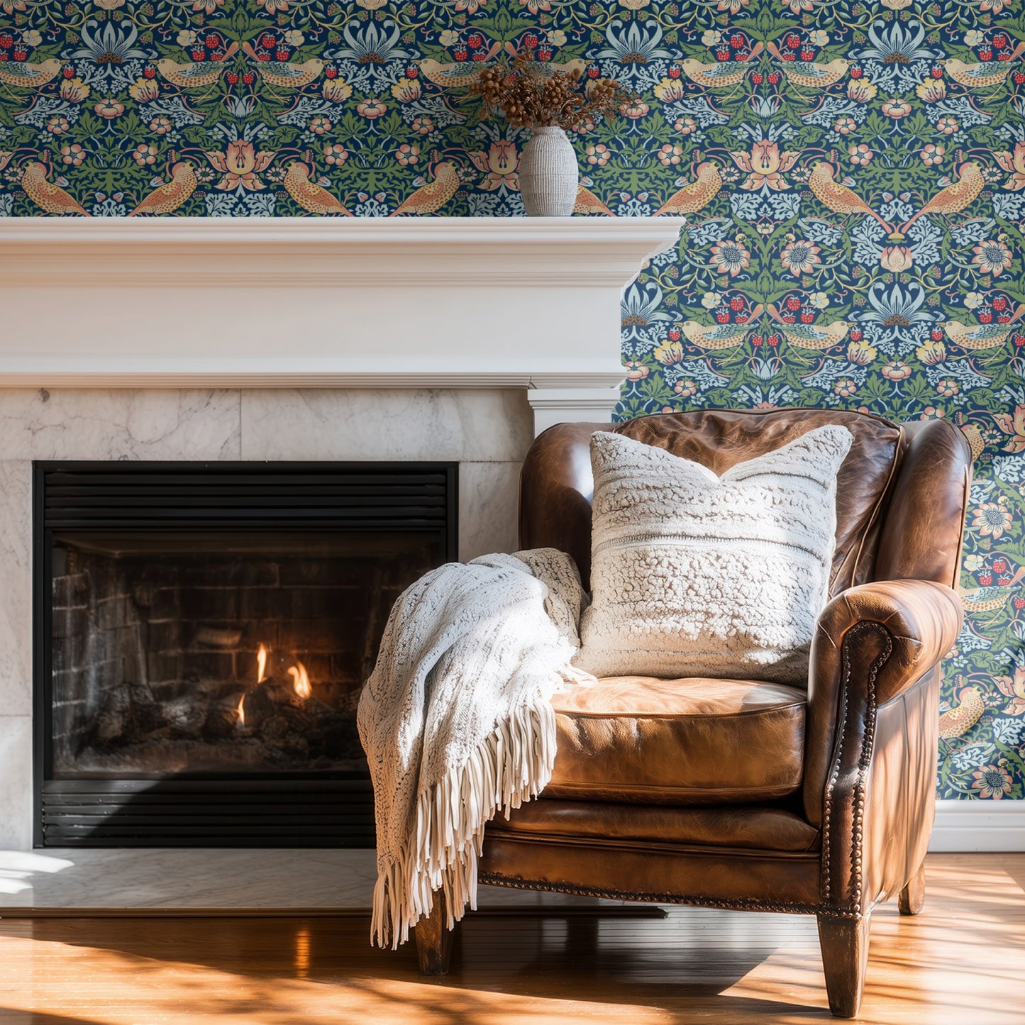 Blue Bird Pattern Wallpaper shown in a second room with the indigo Strawberry Thief reading as iconic Morris decoration in a calmer palette